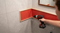 I Didn't Think Paneling Belonged In A Tiny Bathroom Until I Saw This Redo